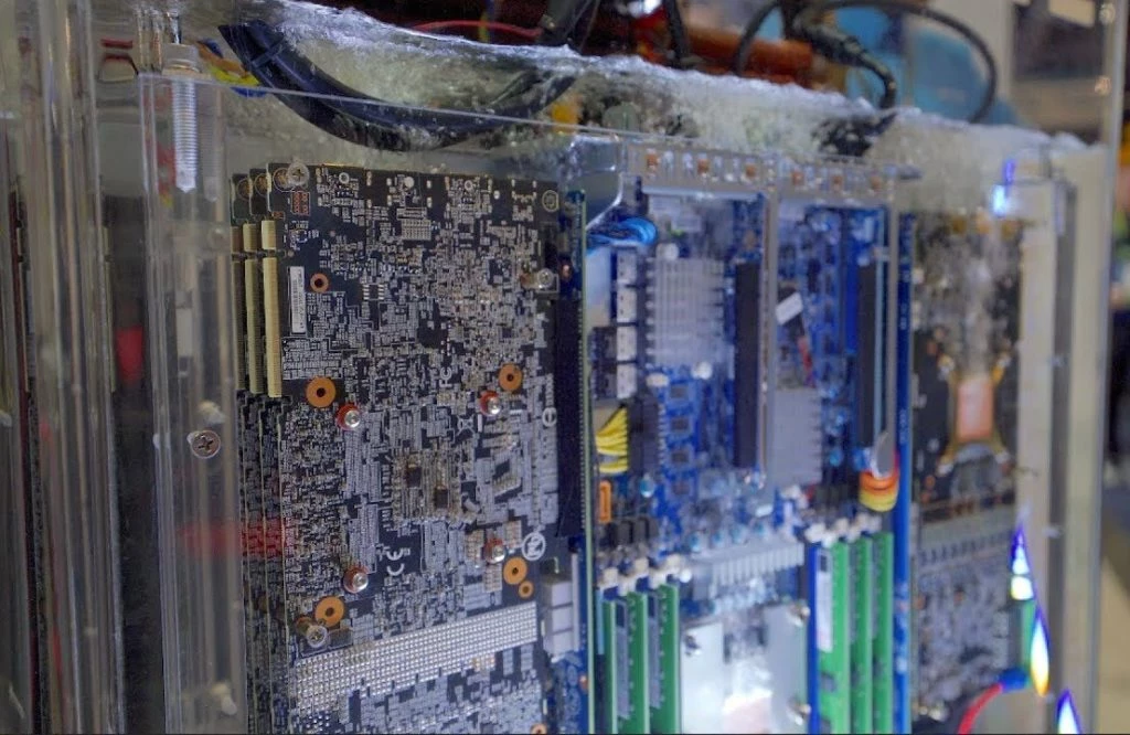 Oil immersion cooling and reductions in data center energy use